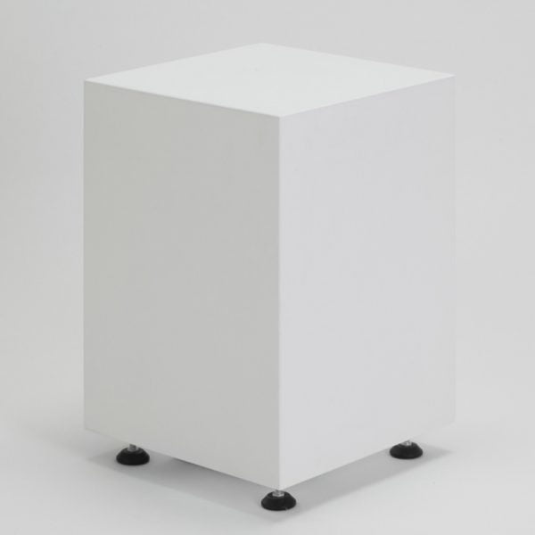 one small white plinth with feet