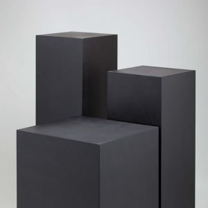 three black plinths